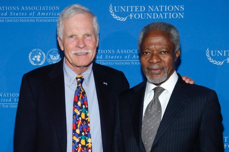 Ted Turner and former UN Secretary-General Kofi Annan pose for a photo in 2012